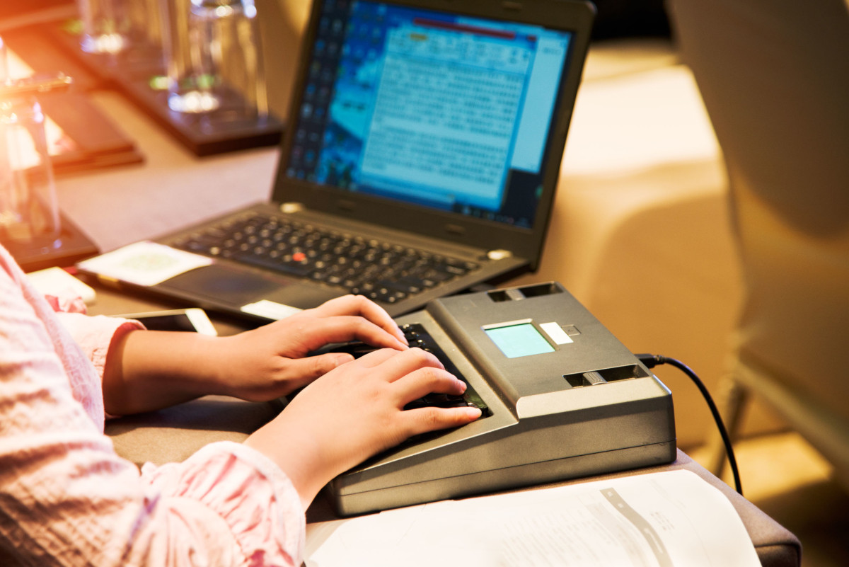 Legal office worker typing a document