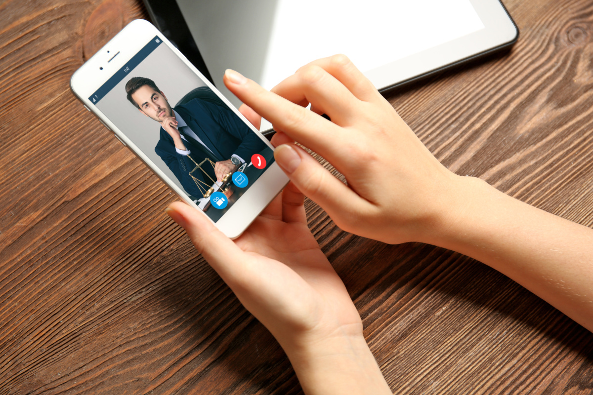 Face-to-face on mobile phone with the lawyer